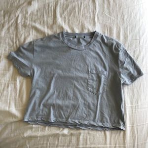 Light blue/periwinkle cropped tee with a pocket
